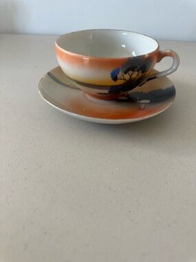 Antique Orange Gradient Cup and Saucer with swan at sunset accent
